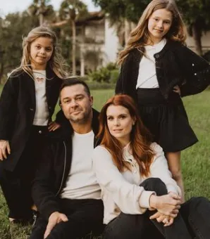 JoAnna Garcia Swisher with husband and daughters