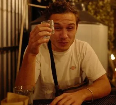 Actor Finn Cole with a glass in his hand