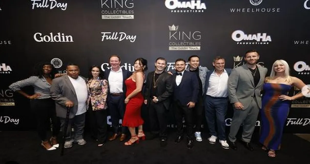 The cast and crew of King of Collectibles The Goldin Touch season 2 are seen posing on the red carpet.