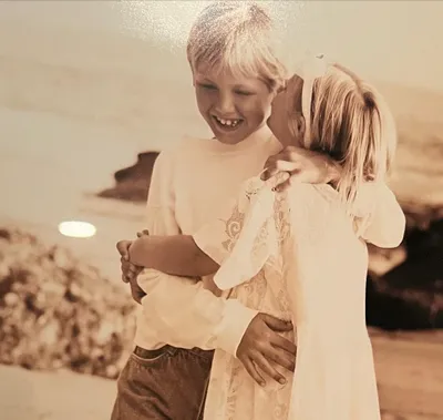 Shared childhood photos of both Olivia Flowers and her brother Conner Harry Flowers.